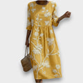 Vira | Vestido midi con estampado de plantas y flores