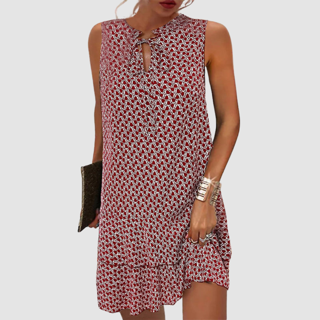 Ava · Vestido mini estampado con lazo