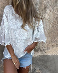 Celia · Blusa romántica con mangas de mariposa