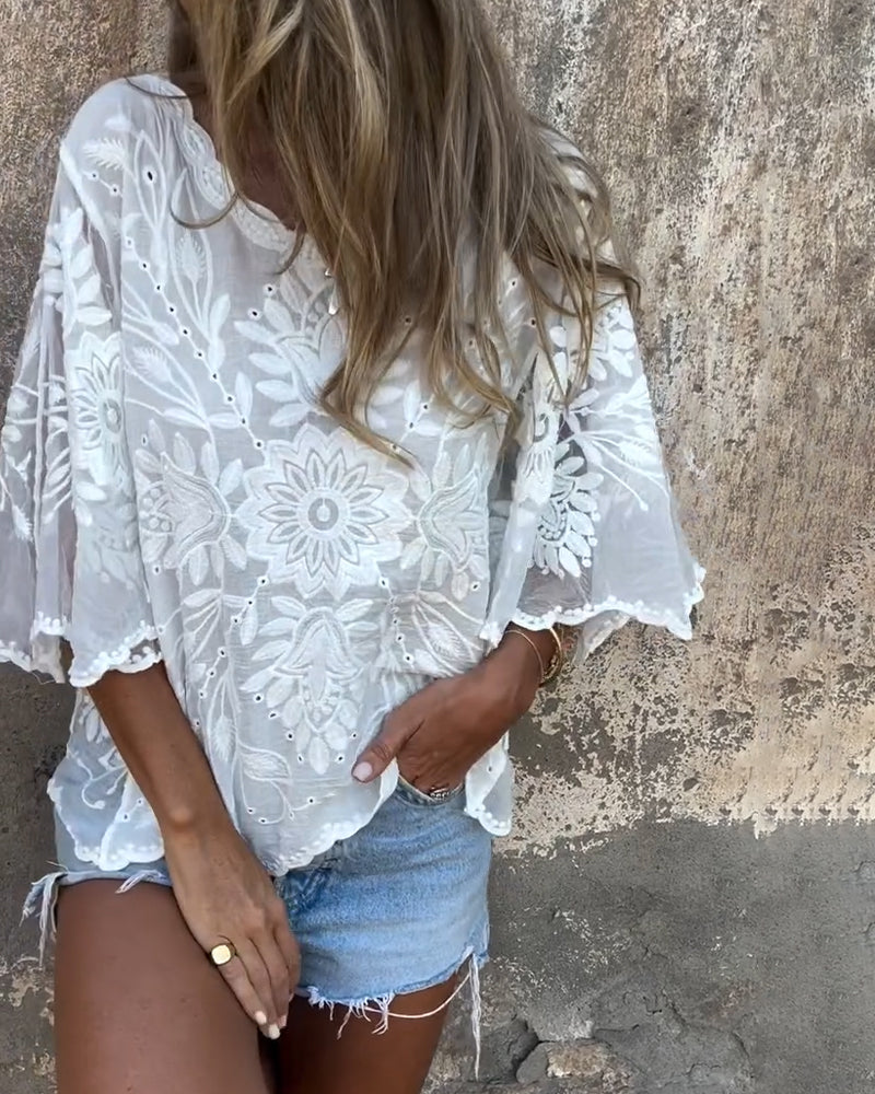 Celia · Blusa romántica con mangas de mariposa