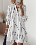Lucía · Vestido camisero con estampado de rayas