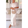 Aurora · Conjunto vestido maxi con capa calada